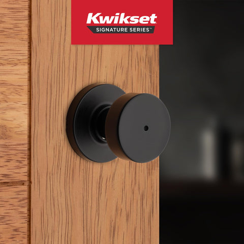 Kwikset Pismo privacy knob side view shows slim profile for modern interiors.