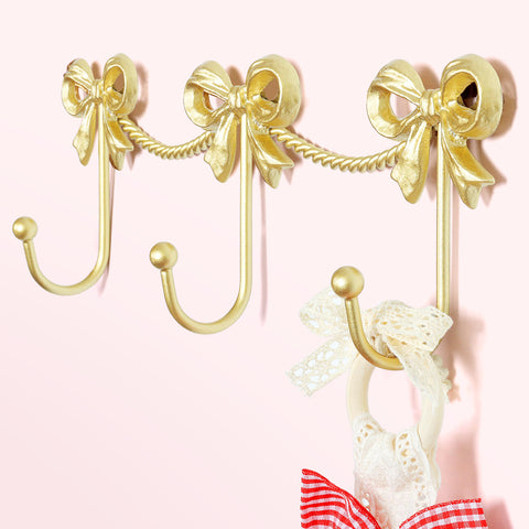KYIAANY gold bow hooks wall mount with three hooks for organized outfits