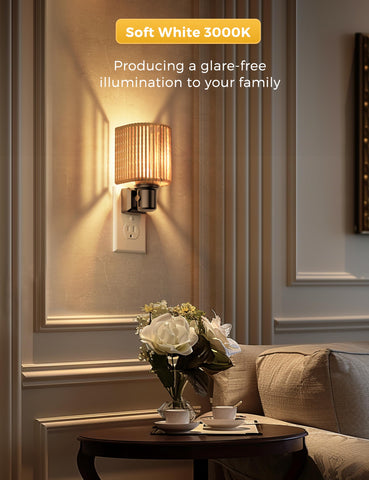 L LOHAS LED night light on a bedside table in a cozy bedroom setup.