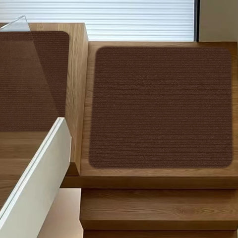 Lacut stair treads brown color complements wooden stairs.