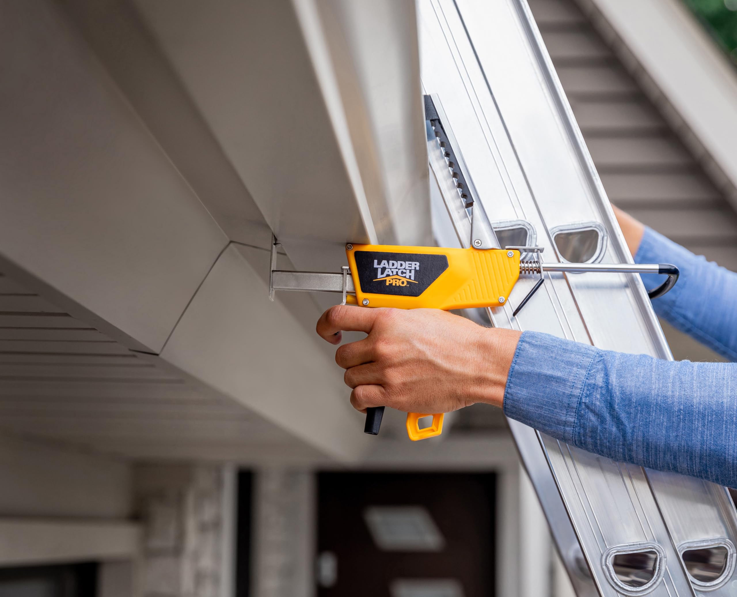 Ladder Latch Pro's adjustable clamp and rotating hook accommodate both sides of the ladder.