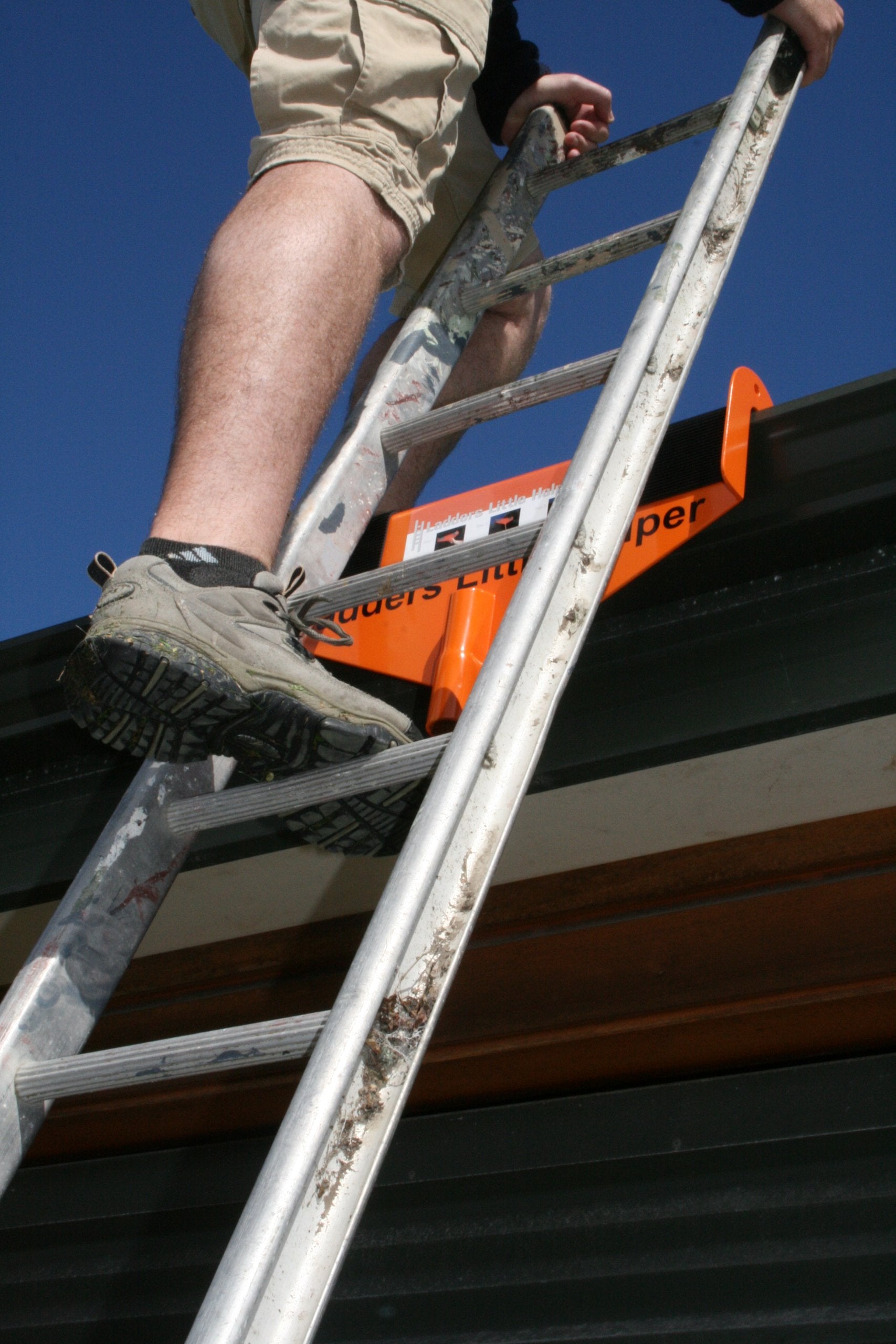 Ladder's Little Helper patented design offers reliable gutter-side support.