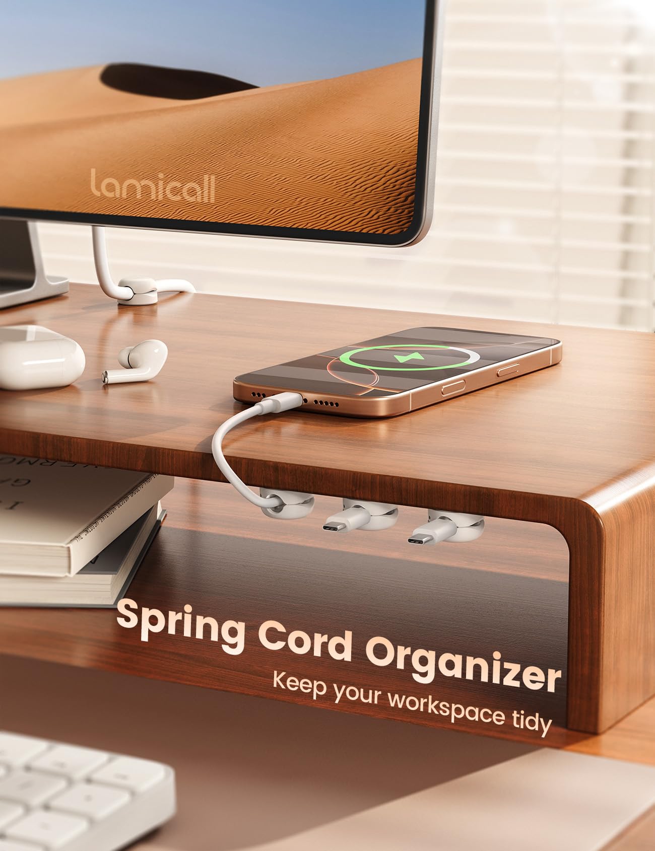 Lamicall cable management clip mounted on a desk for clutter-free workspace.