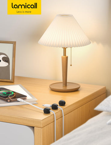 Lamicall magnetic cord organizers line the edge of a desk or wall.