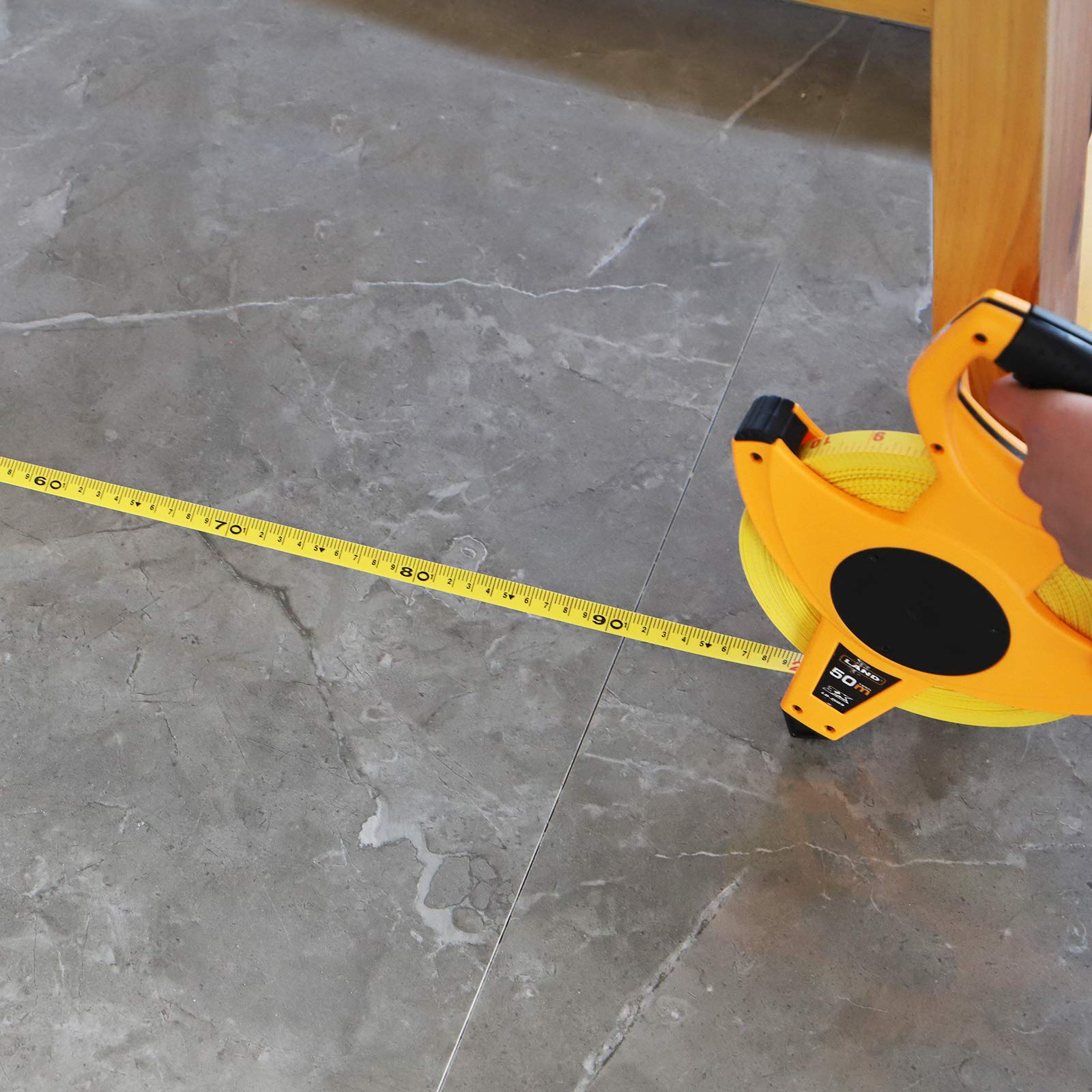 LAND fiberglass tape measure ideal for construction and surveying tasks