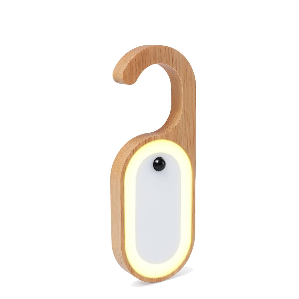 LANDGOO motion sensor LED keyhole light illuminating a door lock at night