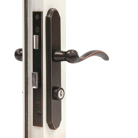 Larson Revere mortise handle set assembly in aged bronze for secure, stylish entry.