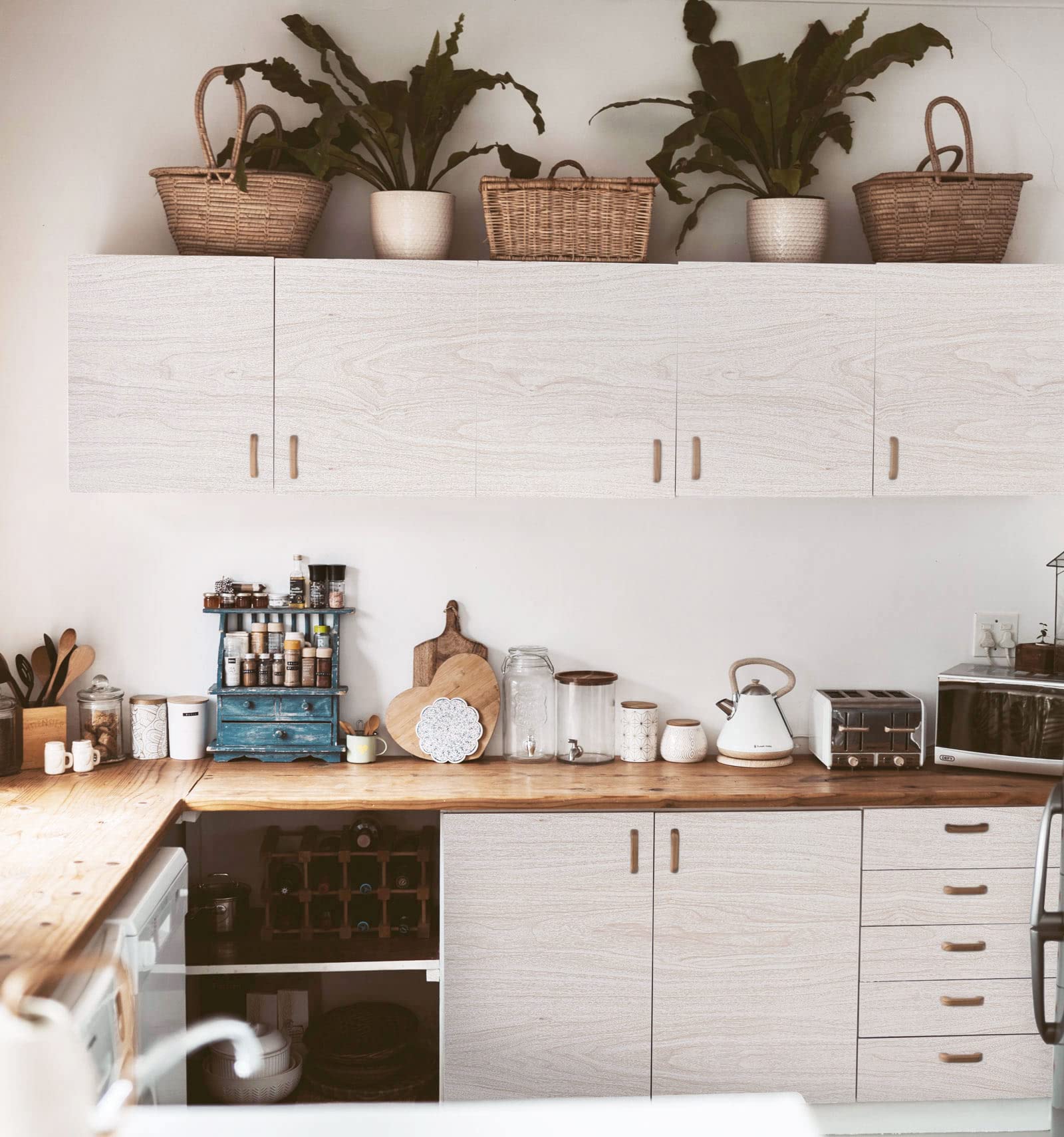 Latico waterproof, easy-clean surface resists spills in kitchen and bathroom.