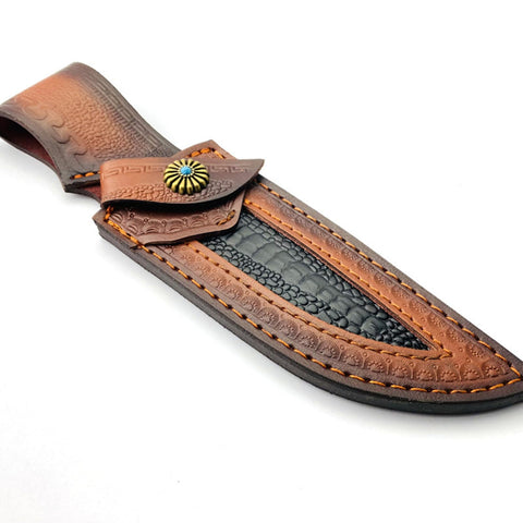 Leather Knife Sheath showing snap closure and sunburst concho for added security.
