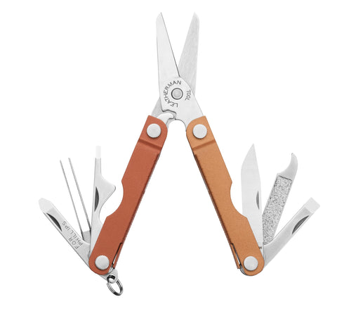 Leatherman Micra Pumpkin Spice tweezers for splinters and fine adjustments.