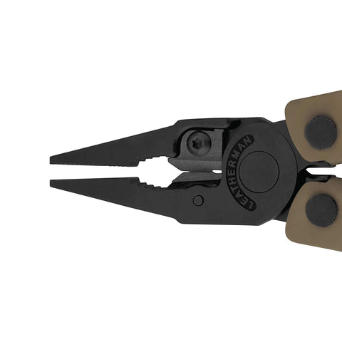 Leatherman Rebar knife and screwdrivers arranged for versatile fieldwork.