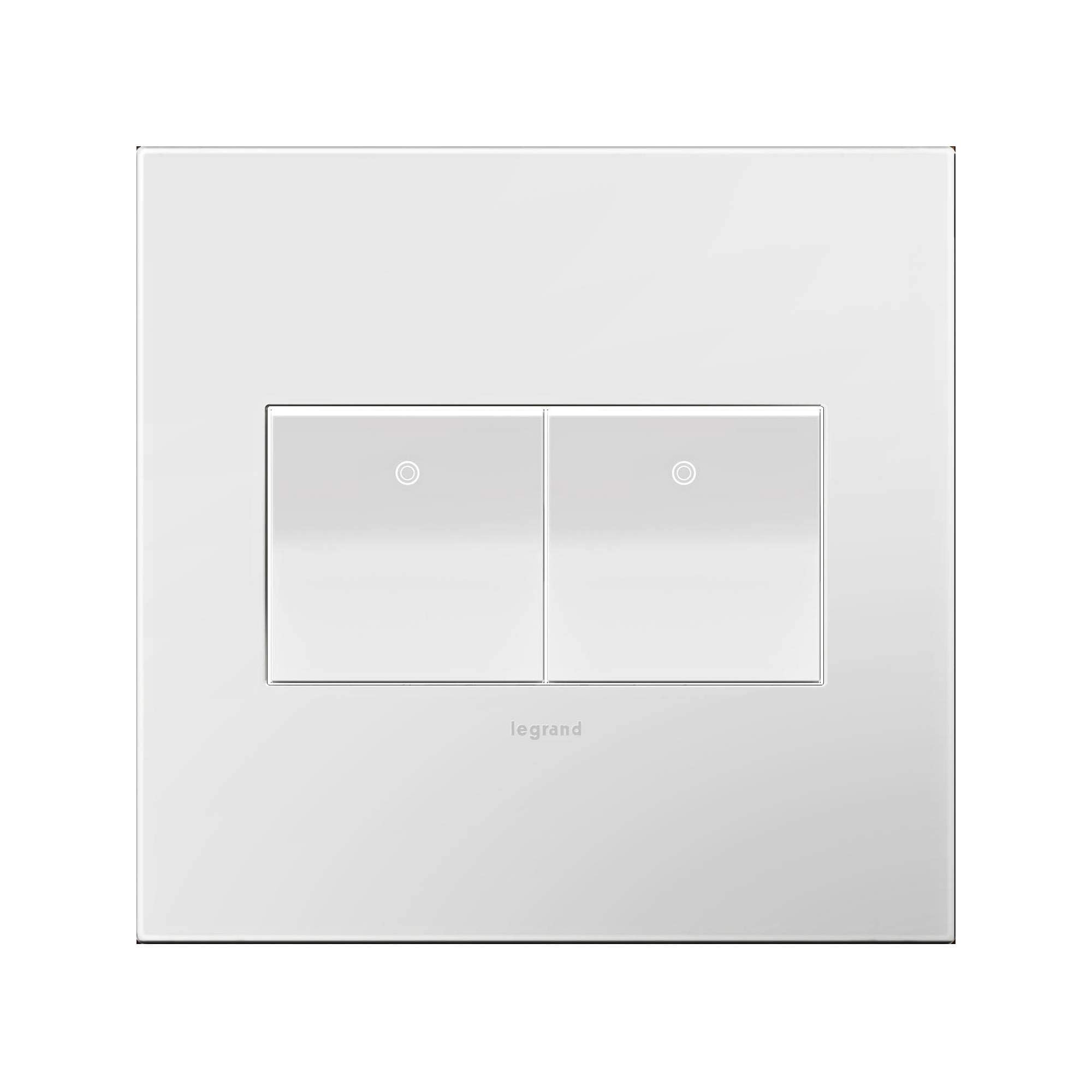 Close-up of gloss white Adorne wall plate showing seamless integration with switches.