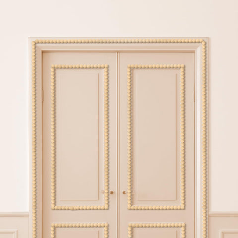 Leinuosen cabinet-ceiling trim in wood tone creates cohesive decor in kitchens and living spaces.