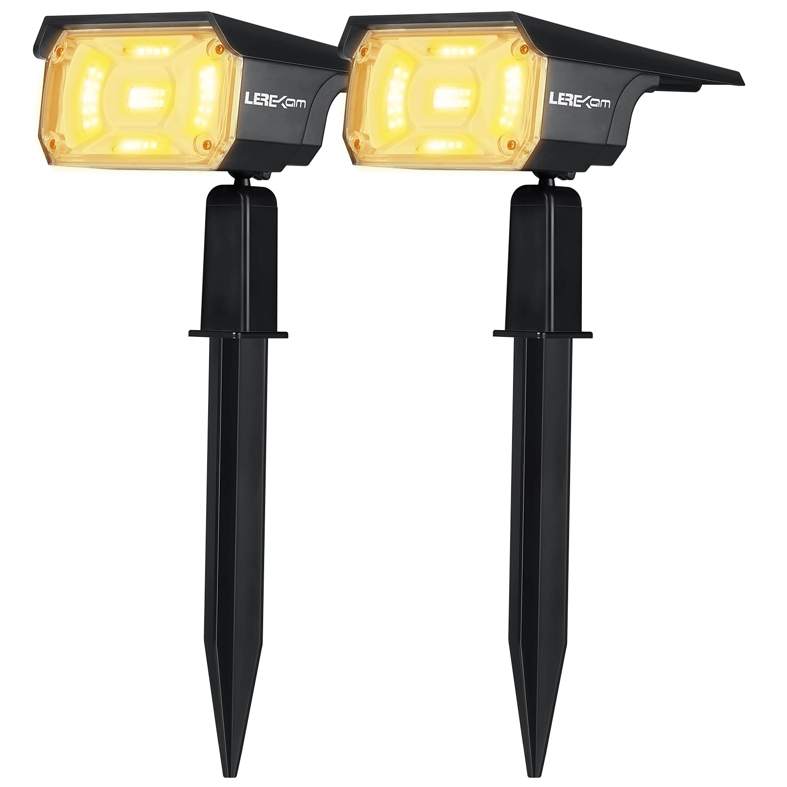 LEREKAM 40-LED solar spotlights illuminate a garden path at dusk, energy-saving outdoor lighting.
