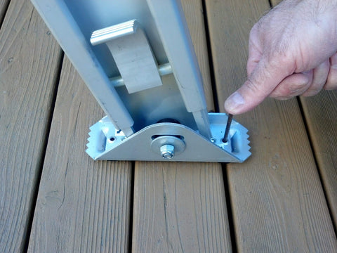 Levelok ladder levelers side view installed on ladder for secure leveling on irregular surfaces.