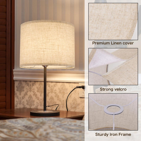 Lampshade mounted on a lamp base with adapters.