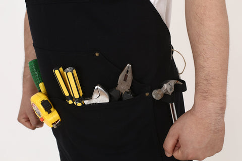 Life Flavor multi-application apron in workshop settings like wood, metal, and food prep.