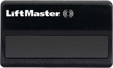 LiftMaster 371LM remote clipped on car visor for quick access.