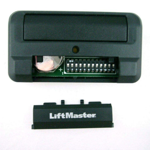 LiftMaster 811LM remote close-up of 12 code switches for enhanced security and range.
