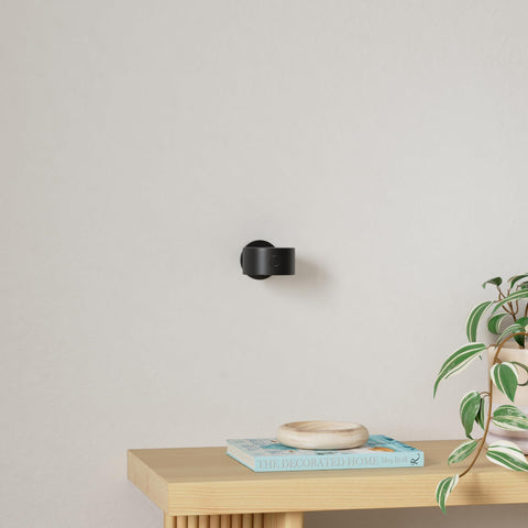 Lightbiz wall light with 360-degree rotation for versatile bedside use