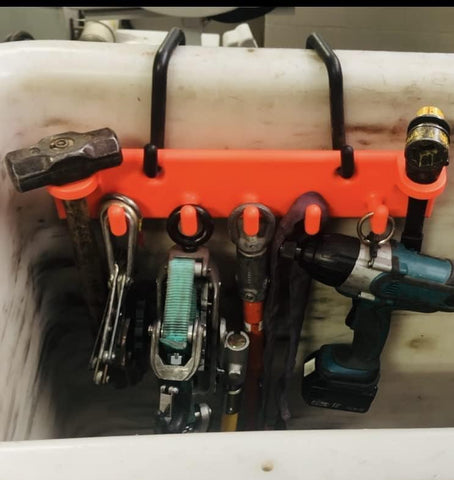 LINE WORK BUCKET PRODUCTS Patent-pending design improves bucket truck workflow