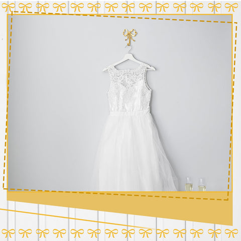 Lineshading gold bow hook in entryway adding decorative organization