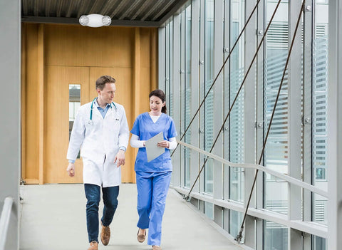 LIT-PaTH white finish blends with ceilings for discreet exit lighting.