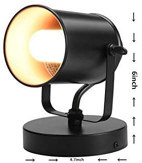 LiveMAX wall-mounted spotlight with adjustable head for precise task lighting.
