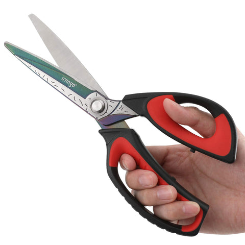 Livingo 10-inch scissors cutting fabric for craft and sewing projects.