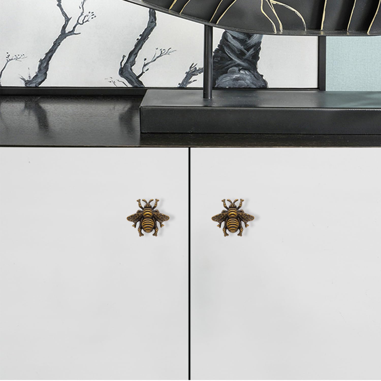Antique dresser with bee knobs for vintage style.