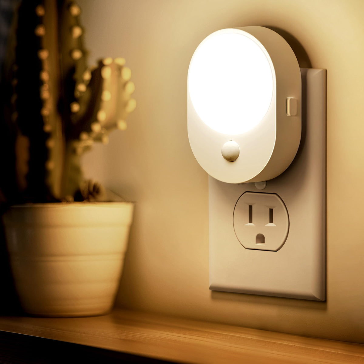 L LOHAS LED motion sensor night light plugged into wall for easy nighttime visibility