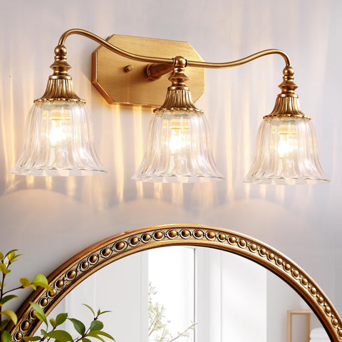 LmnLvn gold vanity light with crystal shade brightens bathrooms