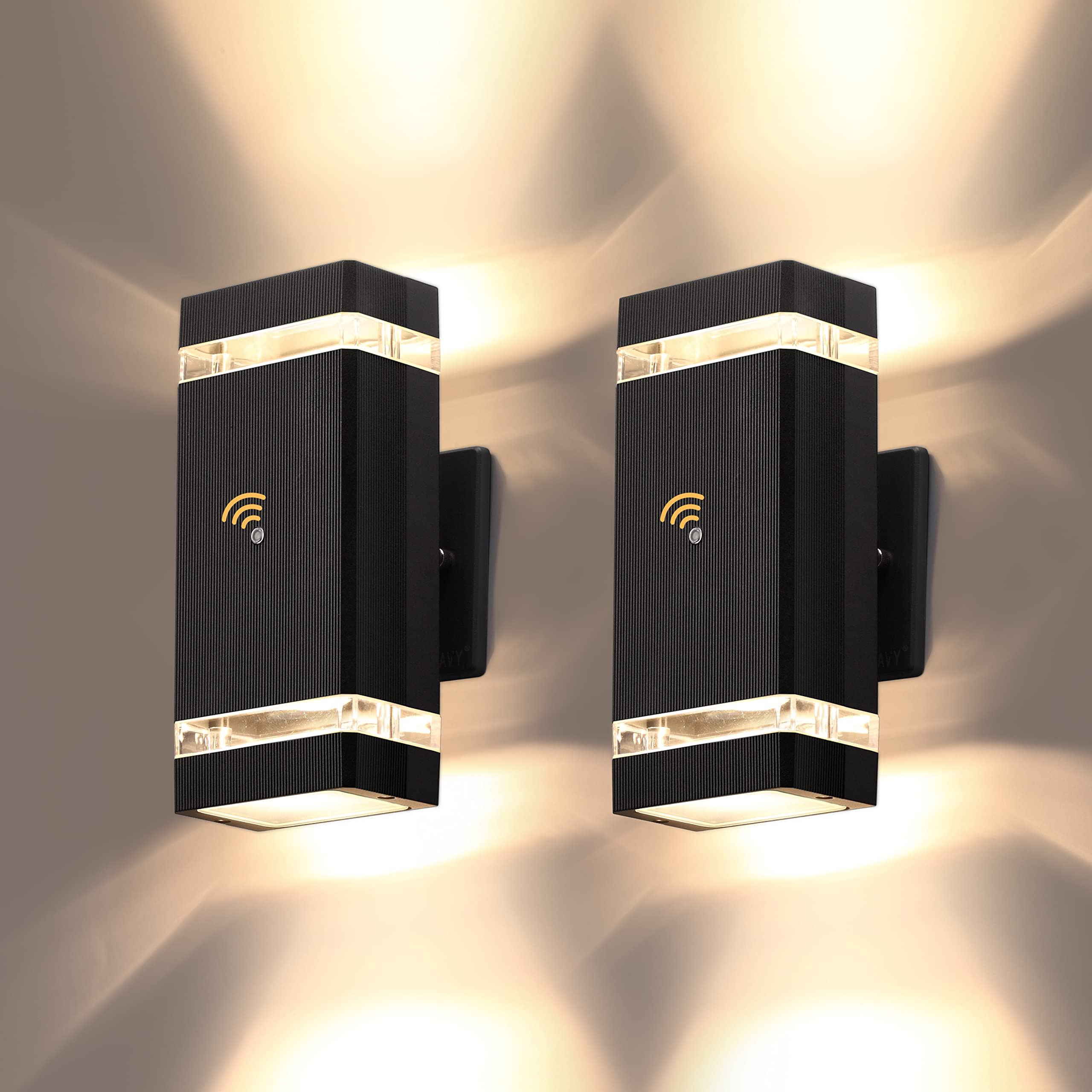 LMP dusk-to-dawn wall sconce on porch with auto-on night glow for convenience.