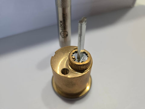 Lock Monkey ergonomic grip handle demonstrates comfortable, precise rekeying work.