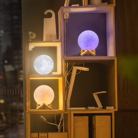 LOGROTATE Moon Lamp remote control demonstrating color changing for mood lighting