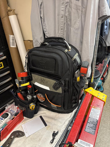 Lokass tool backpack on a job site demonstrates practical storage