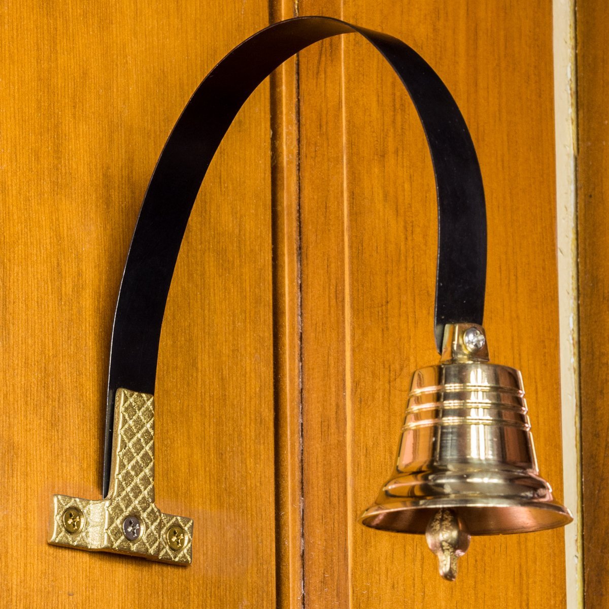 Lone Star Art Shopkeeper Bell close-up of the brass bell showing durability.