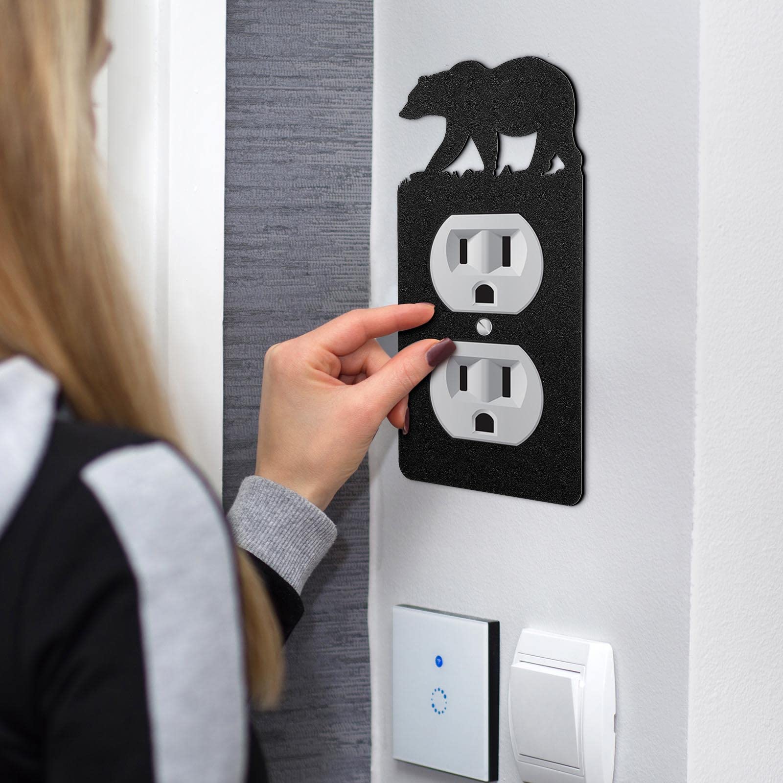 Lothee black metal wall plate offers durability and a sleek, modern look.