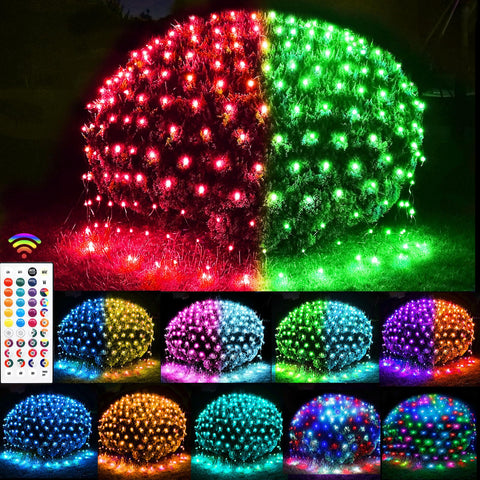 Lovelite 240 LED net lights illuminate a hedge for festive outdoor decor.