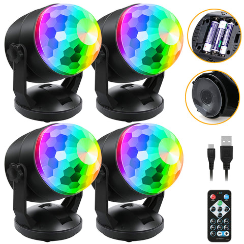 Luditek disco ball light 4-pack on desk creates vibrant party ambience.