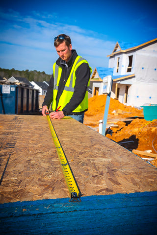 Lufkin Shockforce 35-foot tape in use on-site for versatile reach