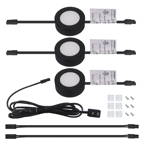 LUMILAND puck light installed under cabinet with connector cable.