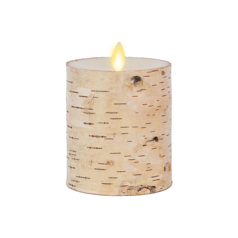Luminara birch bark wrapped pillar enhances natural décor indoors with flameless realism.