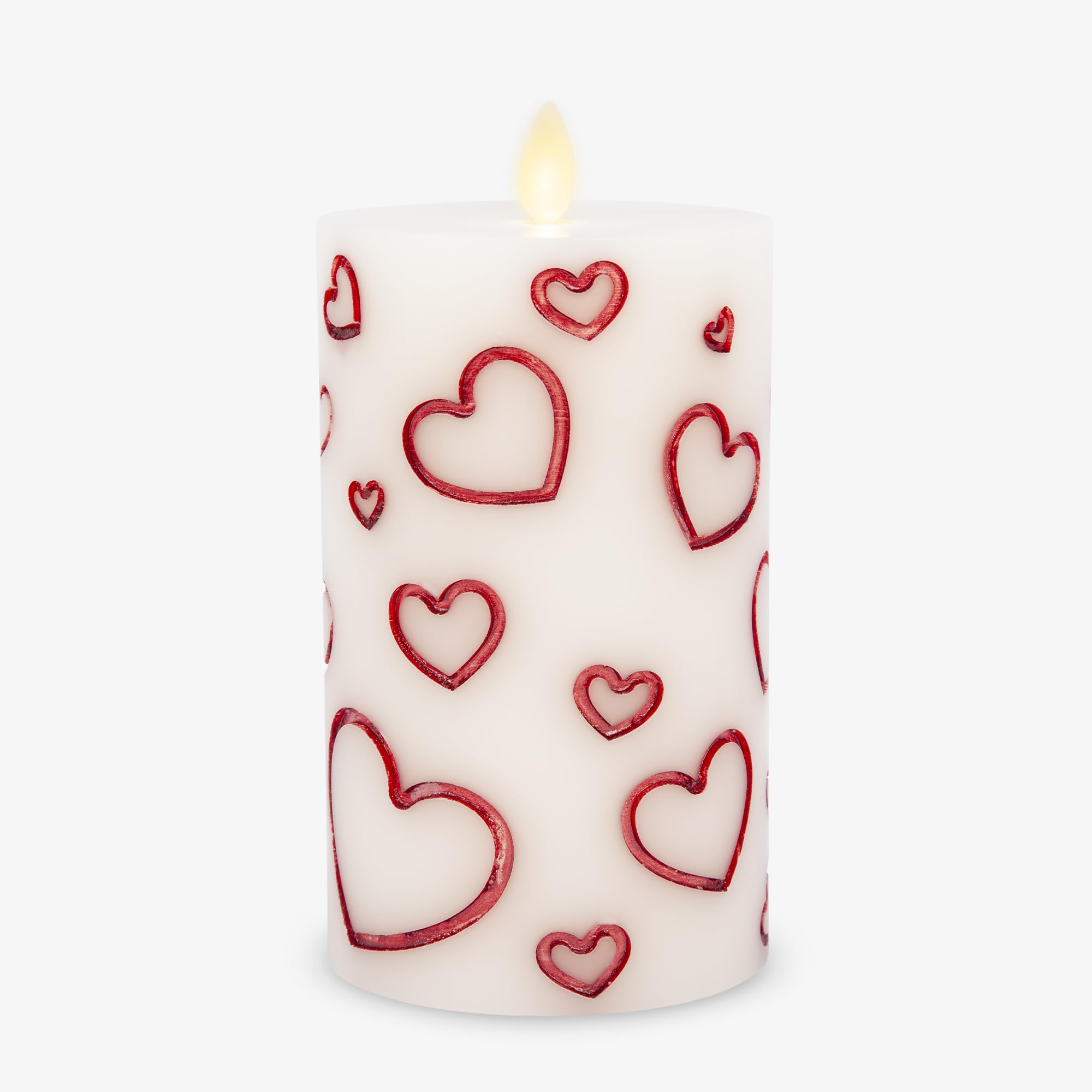 Luminara Debossed Hearts 6.5-inch metallic red pillar candle glowing romantically