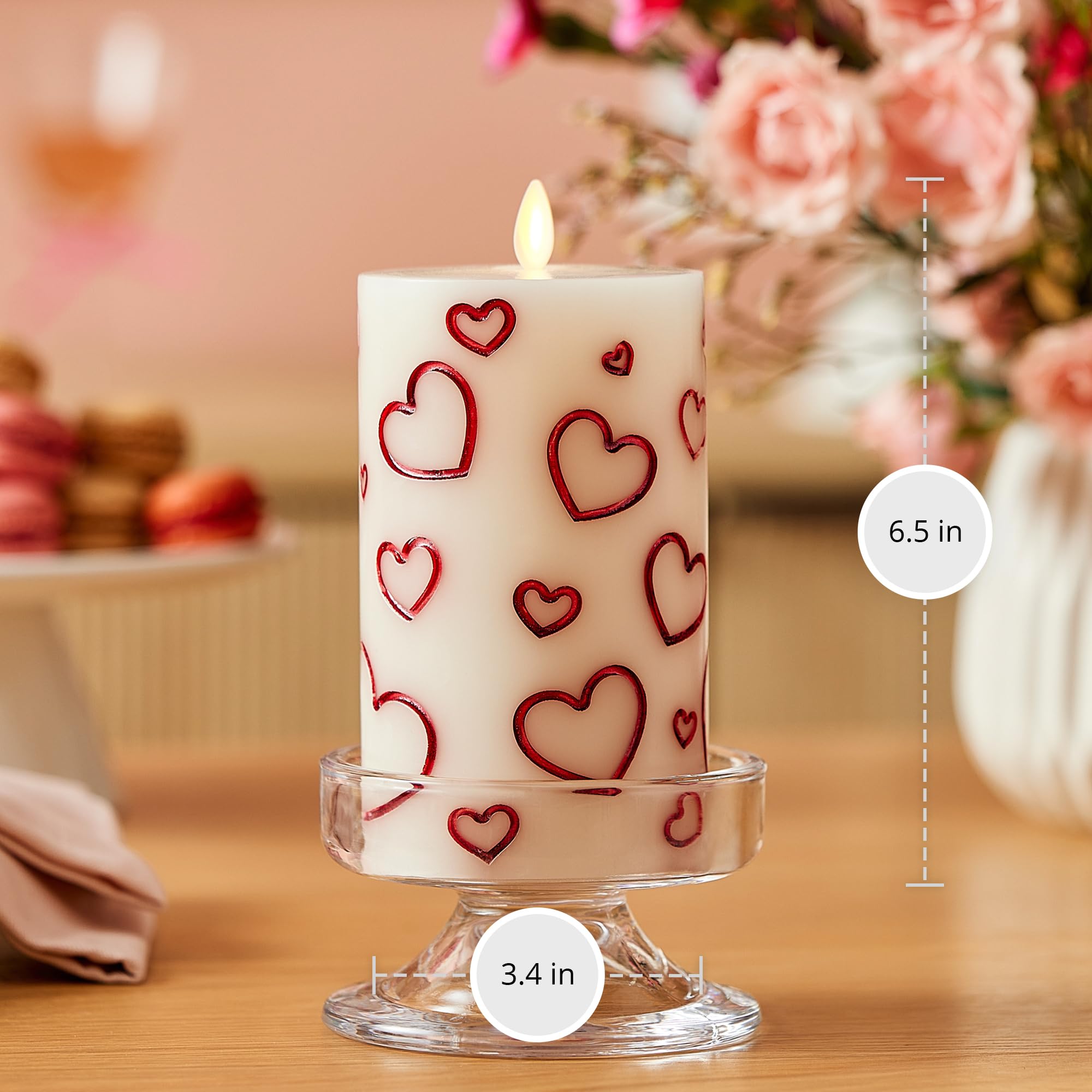 Luminara Debossed Hearts candle timer feature in use