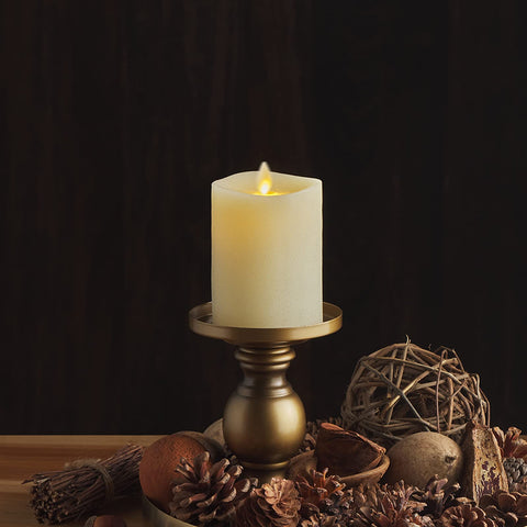 Luminara ivory flameless pillar candle wax-detail shows realistic texture.
