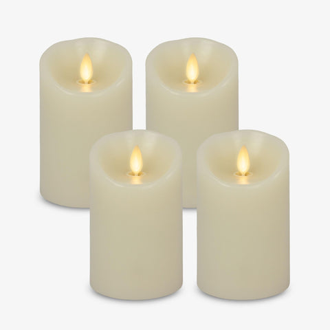 Luminara Ivory pillar candles four-pack provide safe, long-lasting ambient light.