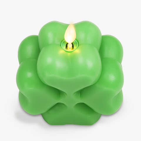 Luminara Saint Patrick's collection shot with lucky shamrock candles.
