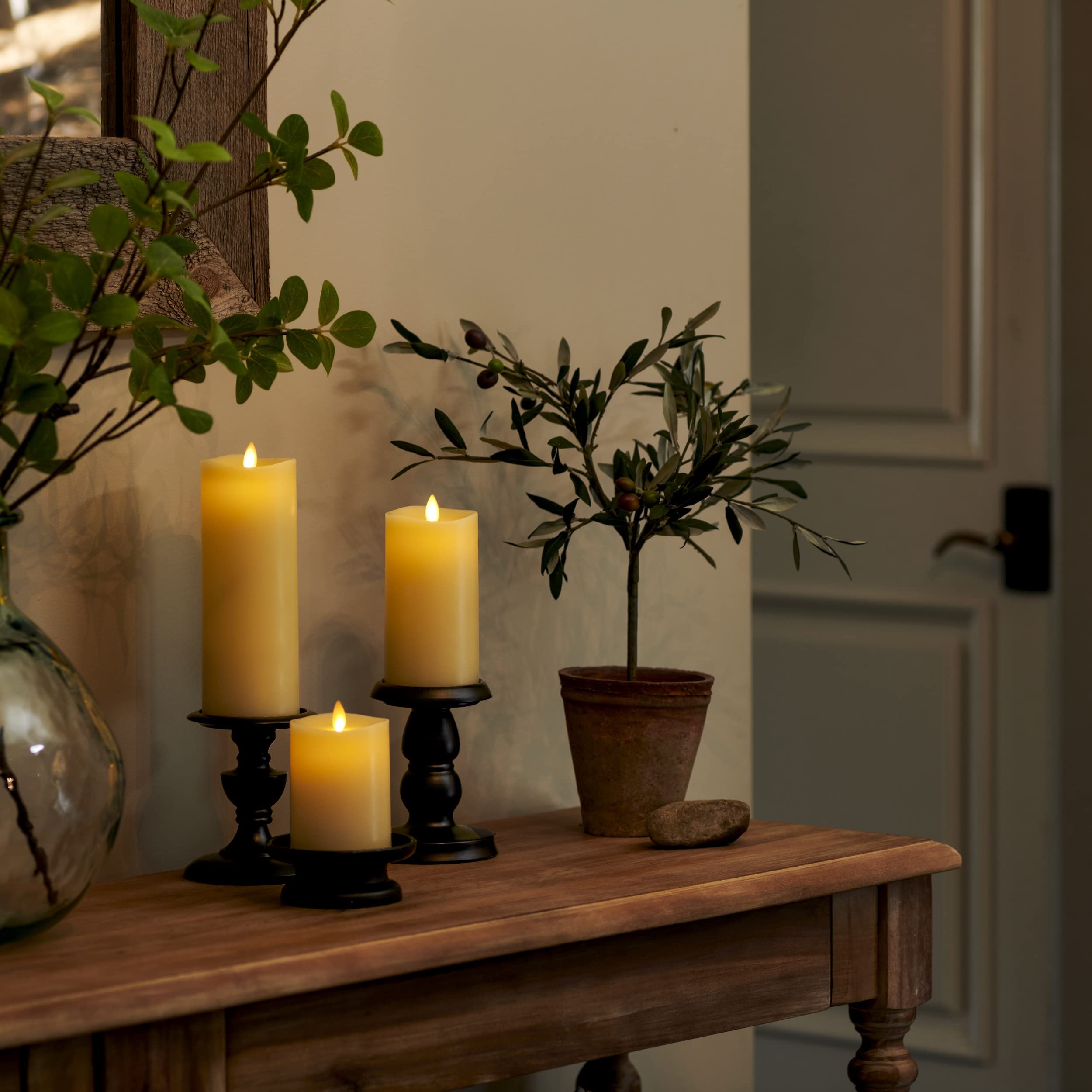 Luminara melted wax tops add realistic candle look