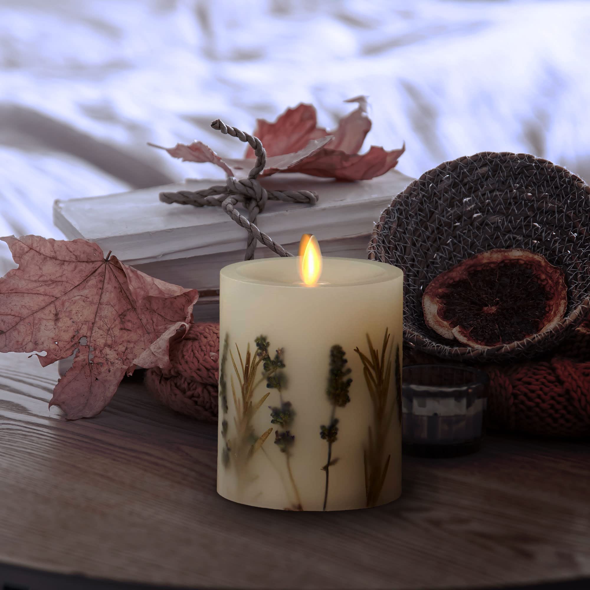 Battery-powered Luminara candle, 2 AA batteries required, remote-ready option available.